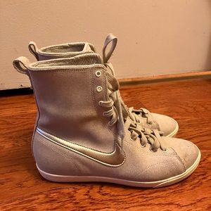 High top neutral tan Nike sneakers lace up